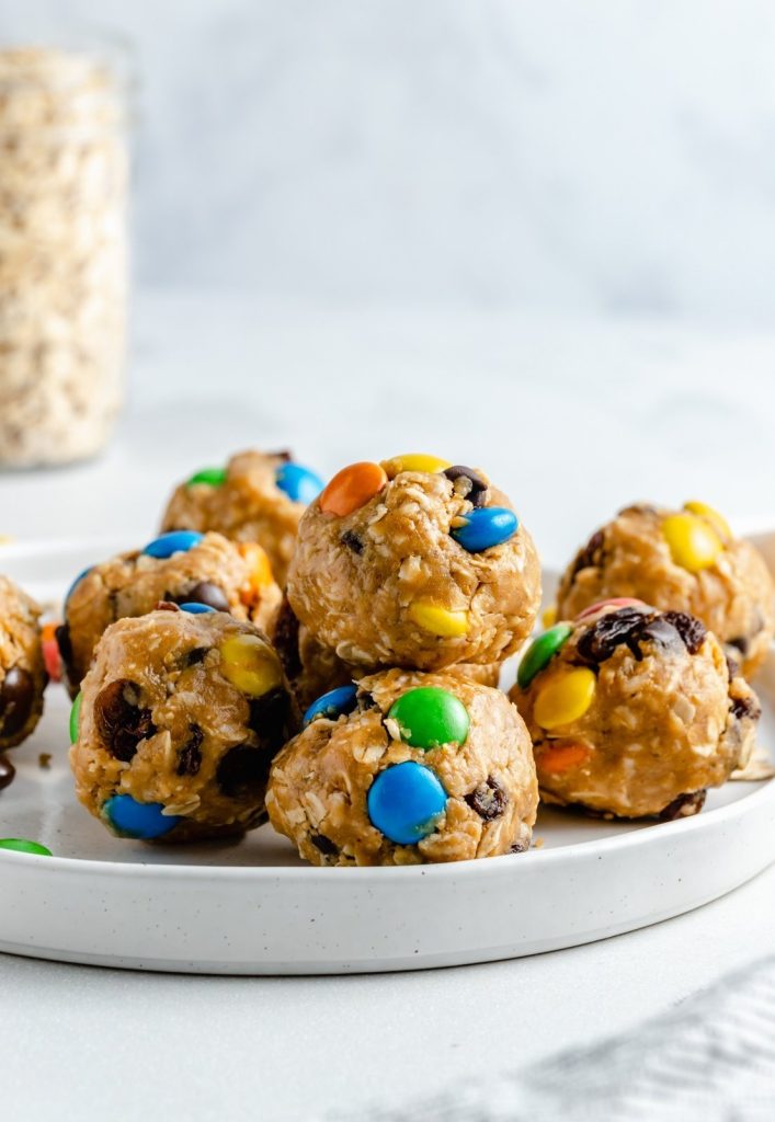 no bake monster cookie energy bites on a plate