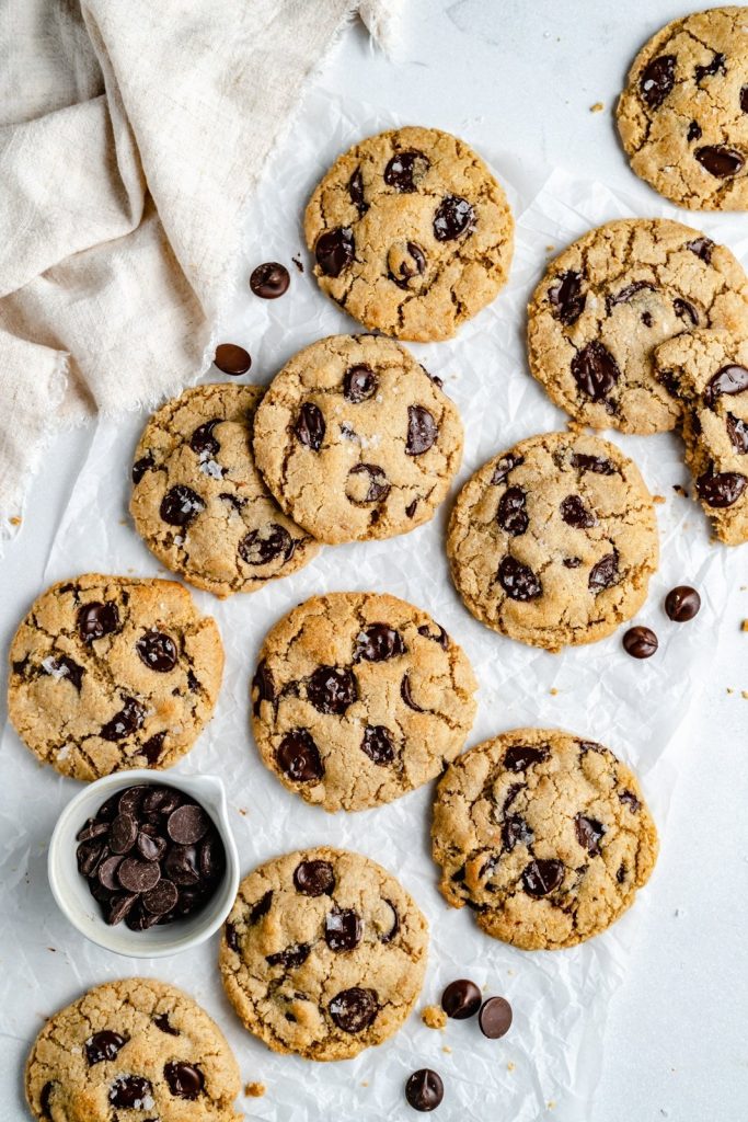 vegan chocolate chip cookies on parchment paper