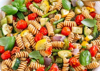 This EASY Roasted Veggie Pasta Salad is loaded with fresh ingredients like juicy tomatoes, zucchini, squash, asparagus, and bell pepper, all tossed together with a delicious lemon herb dressing!