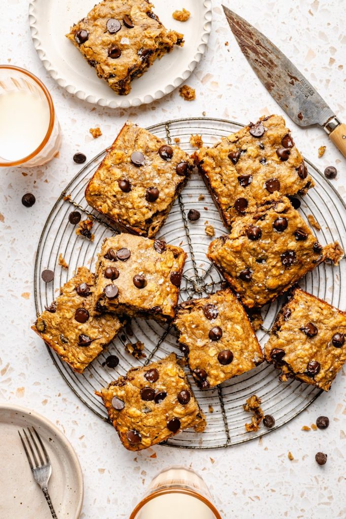 peanut butter banana breakfast cake cut into squares on a wire rack