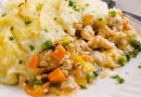 Cozy and delicious Healthy Turkey Shepherd's Pie Recipe made with lean ground turkey, colorful vegetables, rich homemade gravy and topped with lighter mashed potatoes. A healthier twist on a classic comfort food dish the whole family will love!