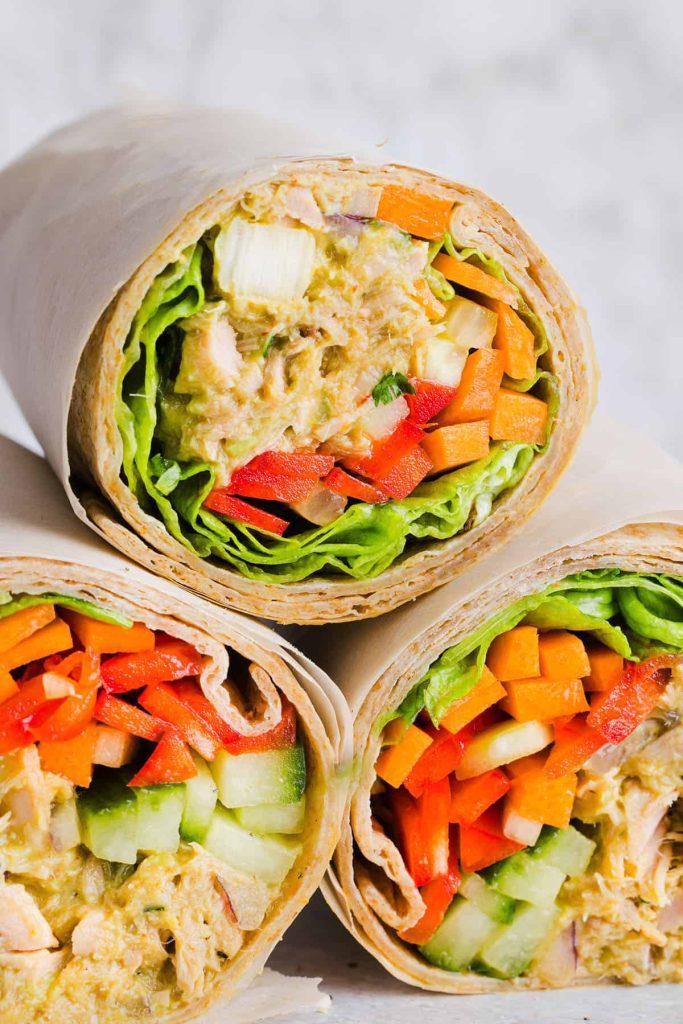 The BEST Spicy Tuna Avocado Wrap made with canned tuna, sriracha, crisp veggies and avocado that easily comes together in just 5 minutes! Delicious high-protein snack with crackers or served in a wrap for a healthy lunch.