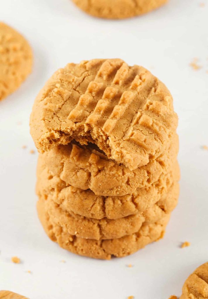 The BEST 5-Ingredient Peanut Butter Cookies recipe made with simple pantry ingredients and zero flour, butter or oil!  Soft, chewy cookies with rich peanut butter flavor are the perfect gluten-free sweet treat.