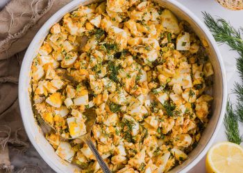 This Healthy Egg Salad is packed with protein, fresh flavors and made healthier with Greek yogurt in place of mayo!  Enjoy this on a sandwich, lettuce wrap, with crackers or straight from the bowl!