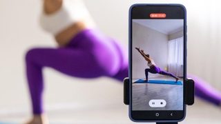 woman analyzing her yoga practice