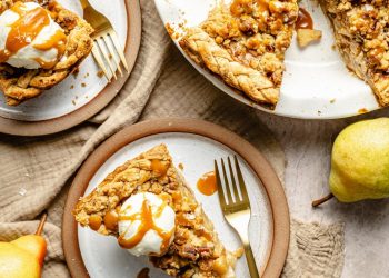 pear pie in a pan and on two plates with vanilla ice cream