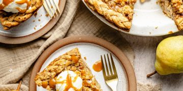 pear pie in a pan and on two plates with vanilla ice cream