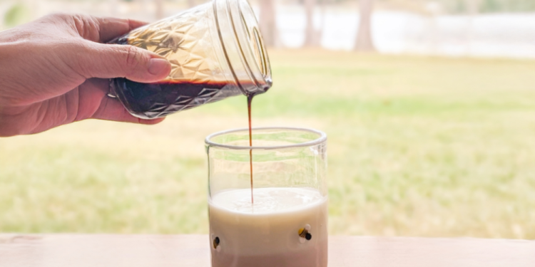 healthy chocolate syrup in a glass of milk